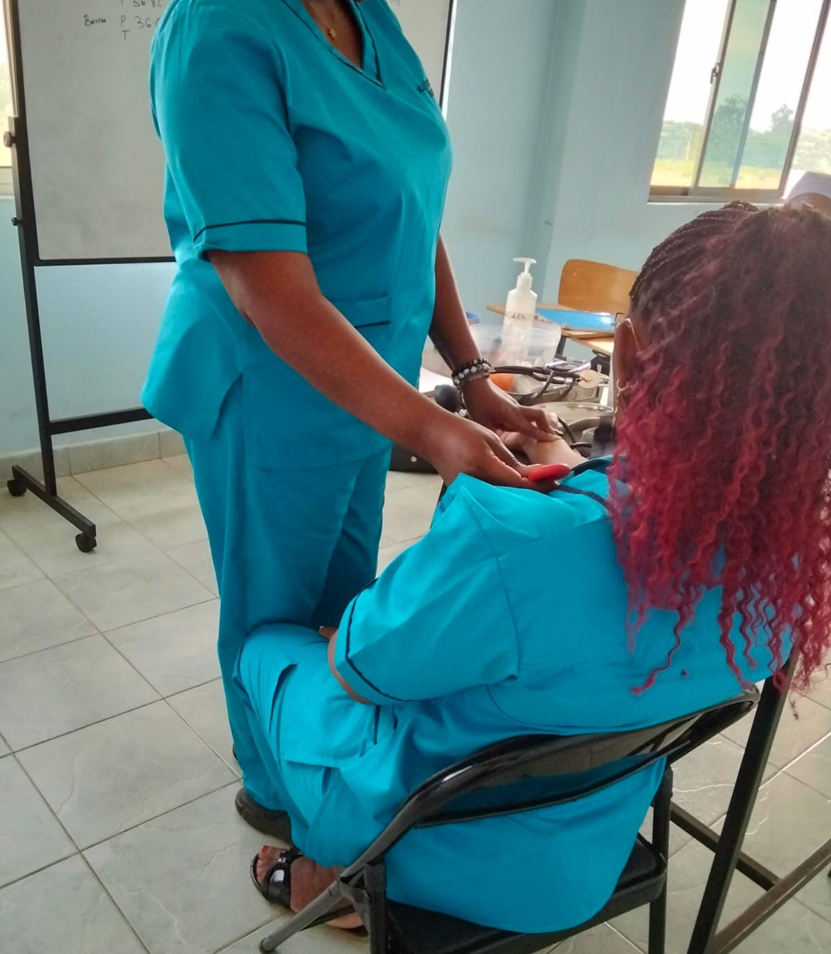 Healthcare Assistant students practicing patient care skills